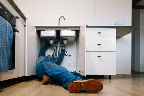 Professional Plumbing technician working in Lawler, IA